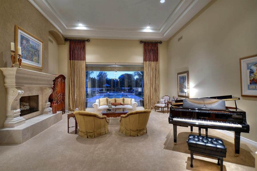 Traditional Living Room with Standard height, Fireplace, Swivel barrel back chair, Cement fireplace, Paint 1, Bergere Chair