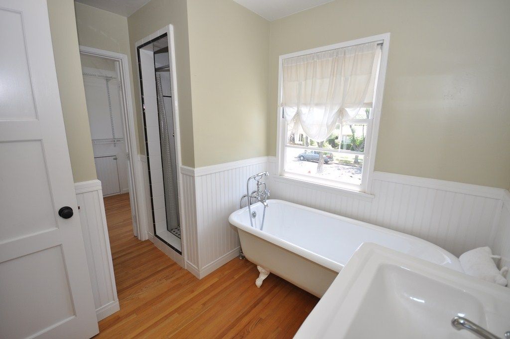 Traditional 3/4 Bathroom with Laminate floors, Wainscotting, 32 sq. ft. Beadboard White V-Groove Panel, Wall mounted sink