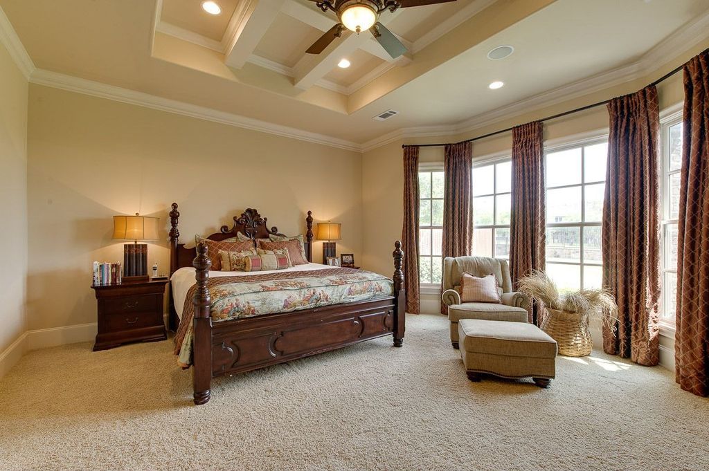 Traditional Guest Bedroom with can lights, Casement, Ceiling fan, High ceiling, picture window, flush light, Carpet