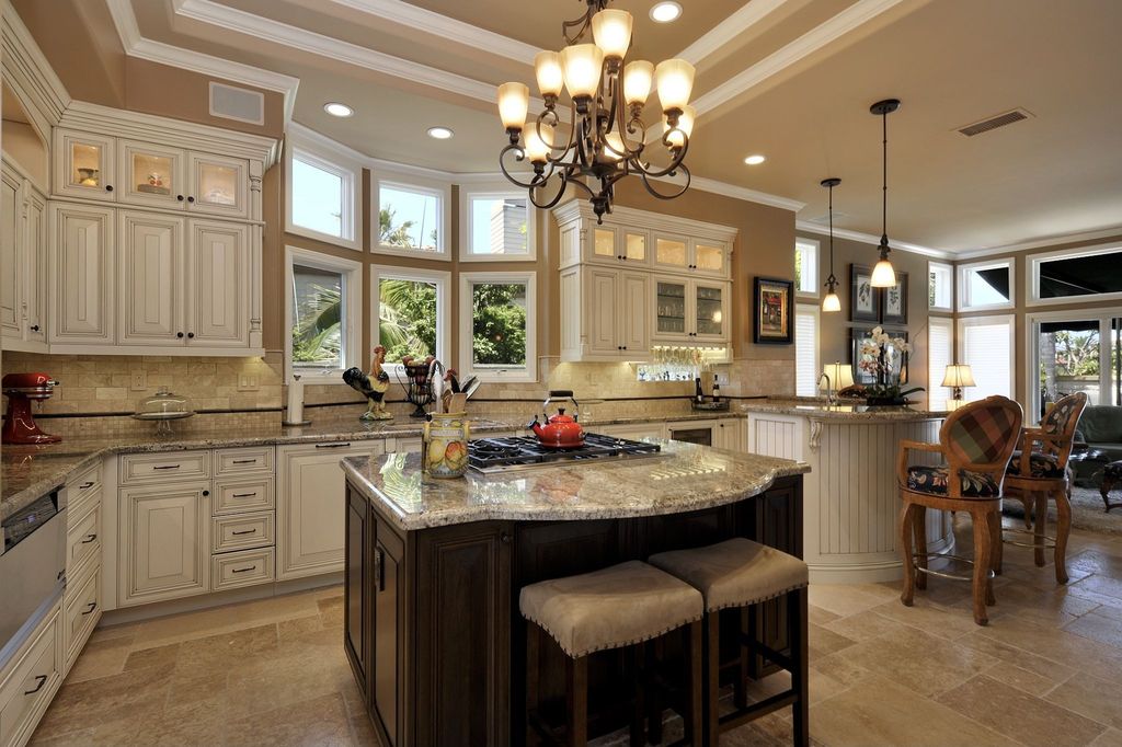 Traditional Kitchen with Glass panel door, picture window, Golden lighting gb 9 light meridian chandelier, Standard height
