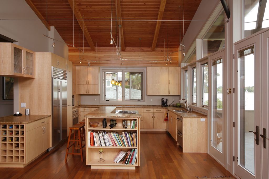 Modern Kitchen with Casement, built-in microwave, double dishwasher, European Cabinets, Breakfast bar, Pendant light, Flush