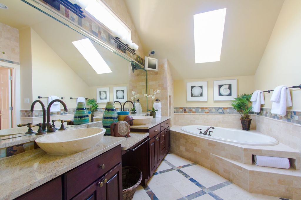 Contemporary Master Bathroom with Standard height, Quartz countertop, Master bathroom, Vessel sink, Skylight, Slate, Bathtub