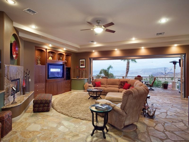 Eclectic Living Room with Chelsea Home Grace Handle Chaise Recliner, stone fireplace, sliding glass door, slate tile floors