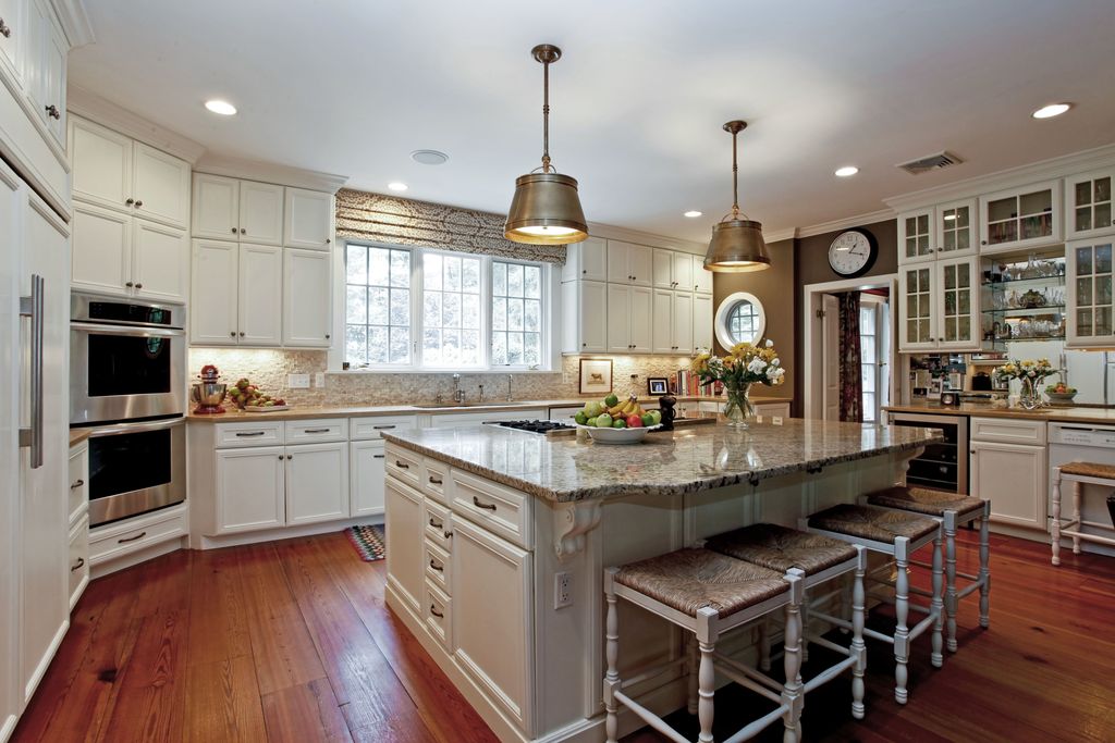 Traditional Kitchen with Glass panel, Simple granite counters, Kitchen island, Standard height, Pendant light, U-shaped