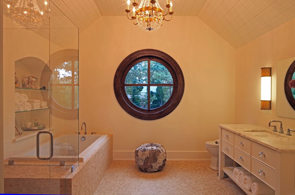 Cottage Master Bathroom with Undermount sink, Bathtub, specialty window, Wall sconce, Master bathroom, Chandelier, Shower