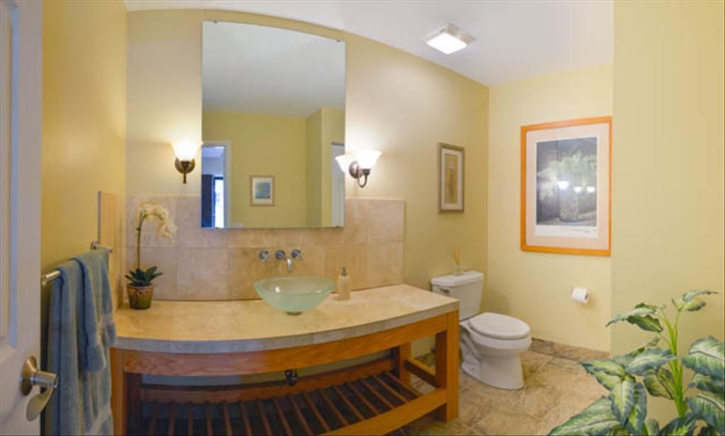 Contemporary Full Bathroom with Wall sconce, Limestone tile counters, Standard height, Full Bath, Paint 1, full backsplash