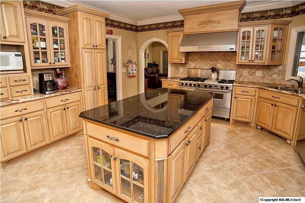 Craftsman Kitchen with stone tile floors, U-shaped, Multiple Sinks, limestone tile floors, Quartz counters, picture window
