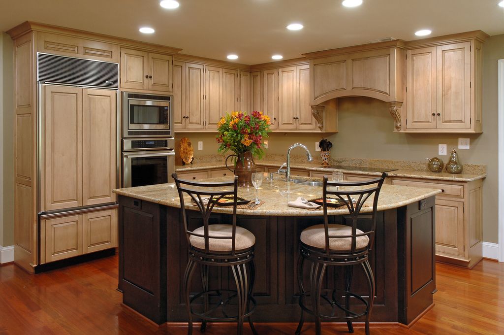 Traditional Kitchen with Inset cabinets, Custom hood, can lights, electric cooktop, Built In Panel Ready Refrigerator