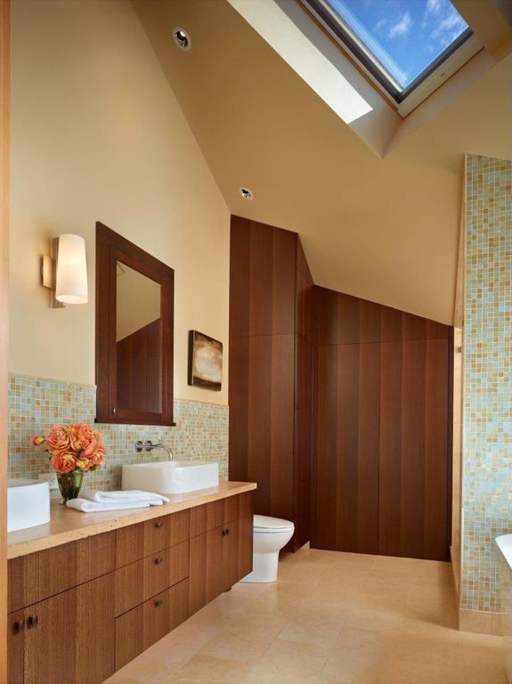 Contemporary Master Bathroom with Bathtub, Vessel sink, Master bathroom, Skylight, Double sink, European Cabinets, Flush