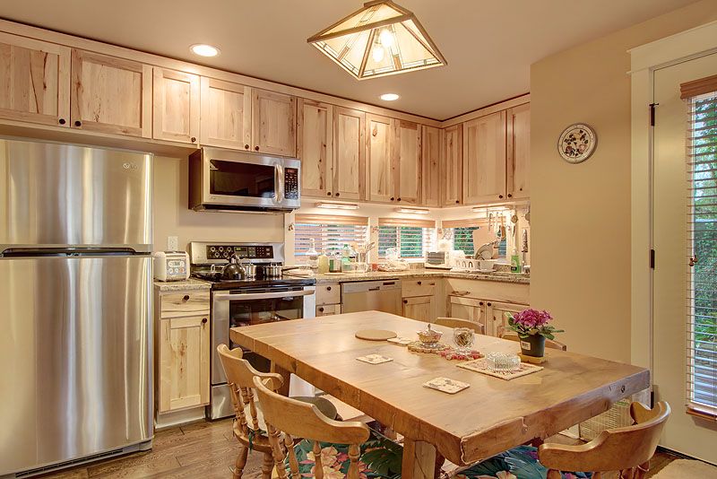 Country Kitchen with Breakfast nook, dishwasher, French doors, gas range, Complex granite counters, Casement, Standard height