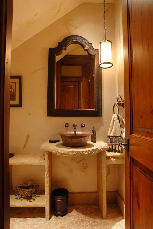 Rustic Powder Room with Uttermost Ribbed Wall Mirror, Pendant light, slate floors, Powder room, Standard height, Vessel sink
