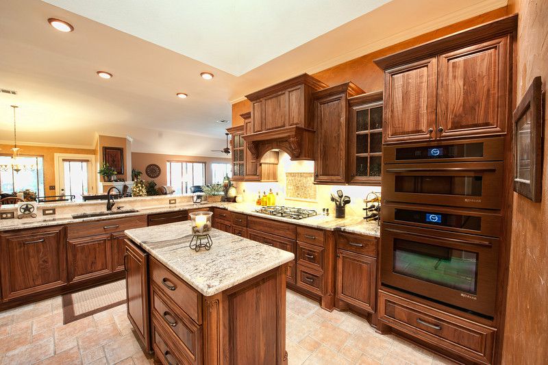 Traditional Kitchen with Paint1, full backsplash, Pendant light, stone tile floors, L-shaped, Casement, single dishwasher