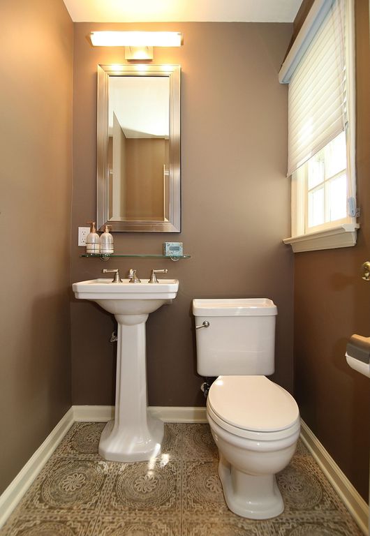 Traditional Powder Room with wall-mounted above mirror bathroom light, picture window, Powder room, Mexican tile