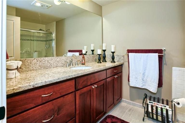 Craftsman 3/4 Bathroom with Simple Granite, Simple granite counters, three quarter bath, Flat panel cabinets, full backsplash