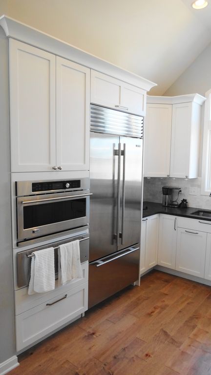 Traditional Kitchen with Jeffrey court carrara 3 in. x 6 in. x 8mm honed marble wall tile, Standard height, can lights