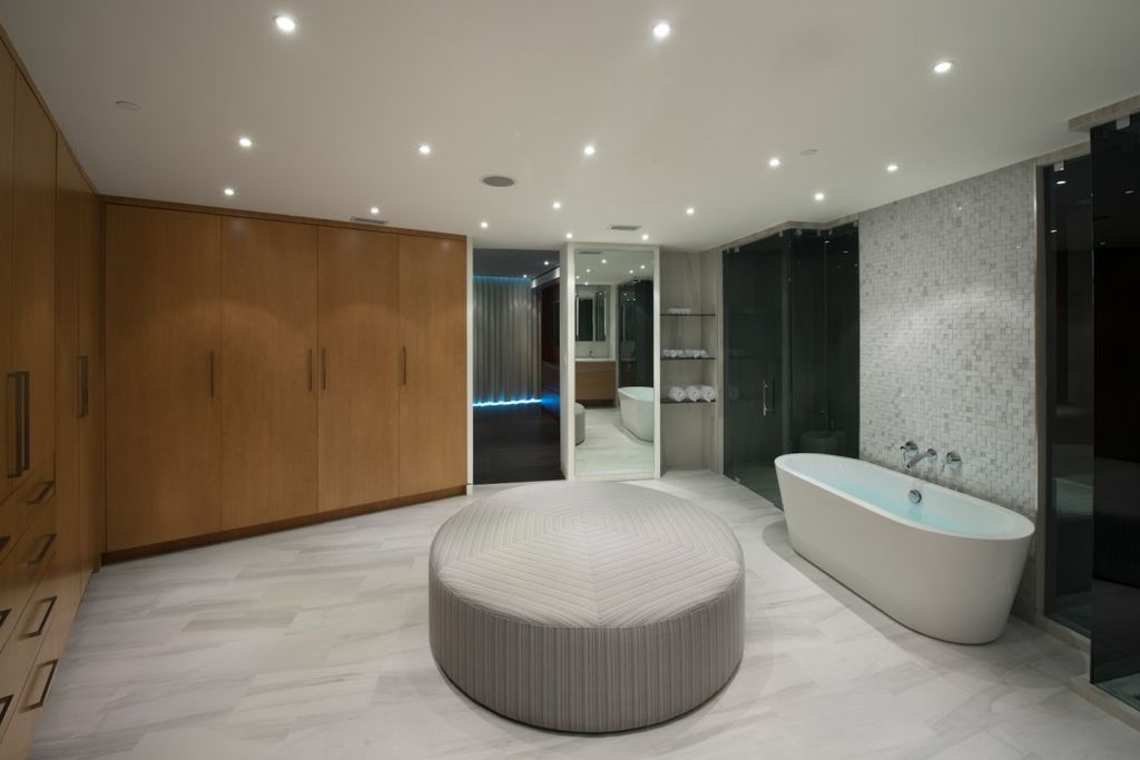 Modern Master Bathroom with Flush, frameless showerdoor, can lights, Standard height, Wall Tiles, stone tile floors, Shower