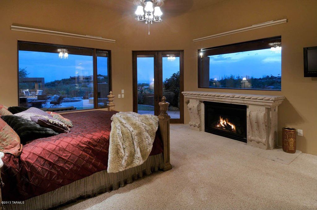 Craftsman Master Bedroom with Cement fireplace, Ceiling fan, Carpet, Fireplace, picture window, Standard height, French doors